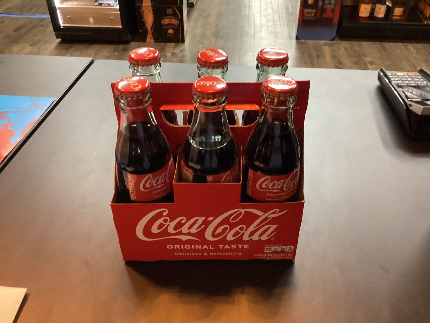 Coke 6 pack bottles 8 oz